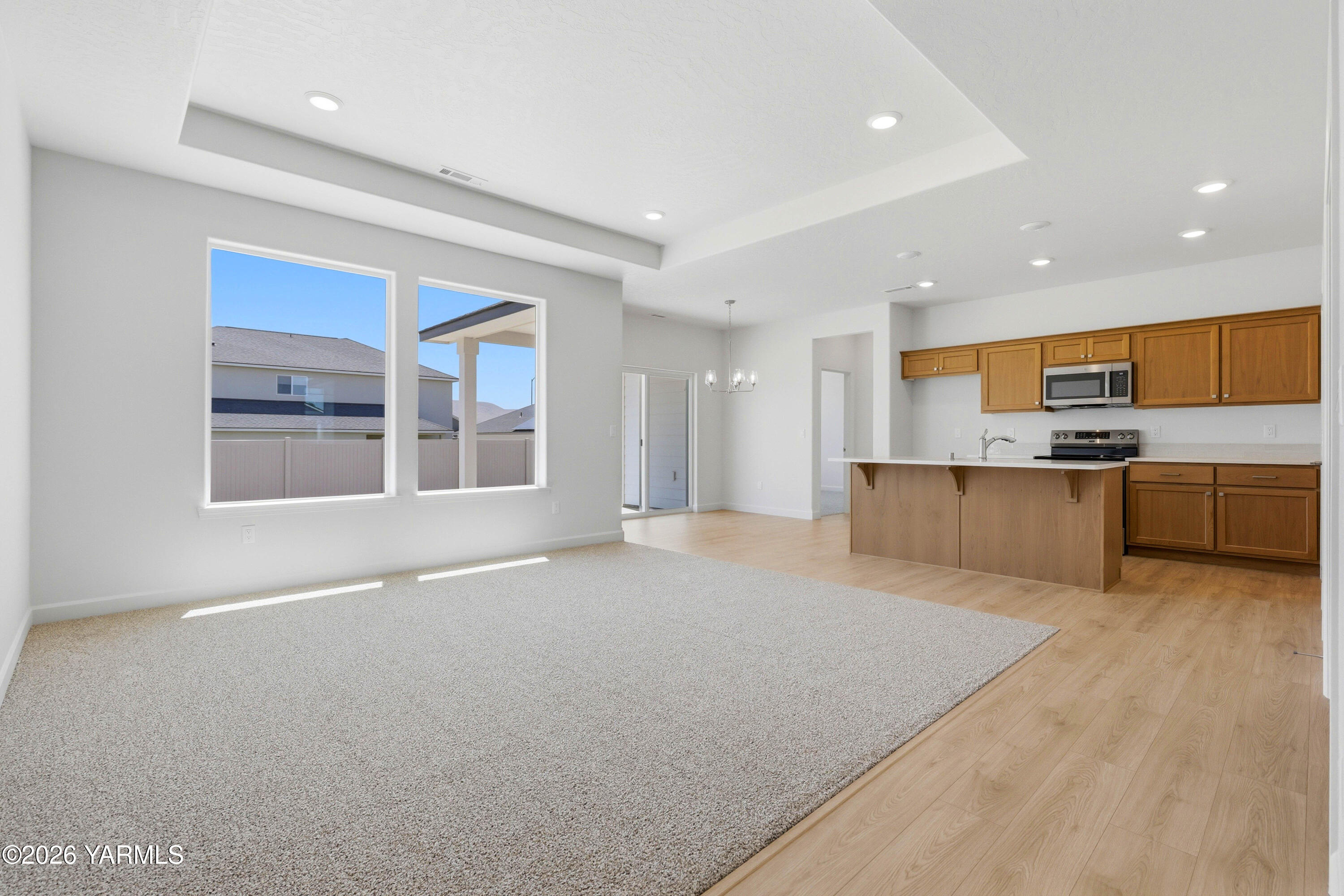 218 Packer Street Prosser, WA 99350 - Photo 9 of 36 a view of kitchen with wooden floor