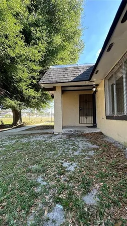 a house with trees in front of it