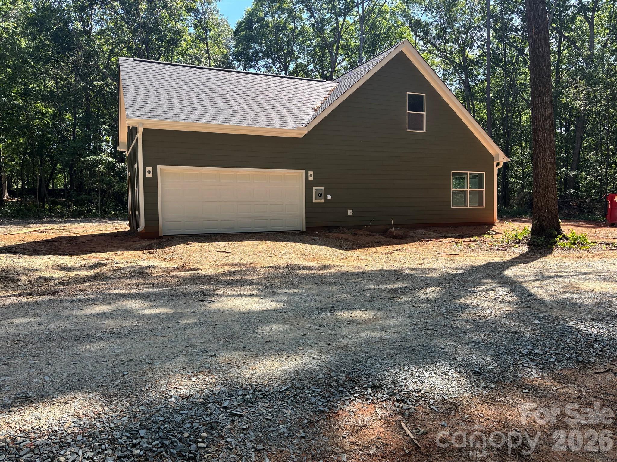 1818 New Salem Road Monroe, NC 28110 - Photo 3 of 8 a house with trees in the background