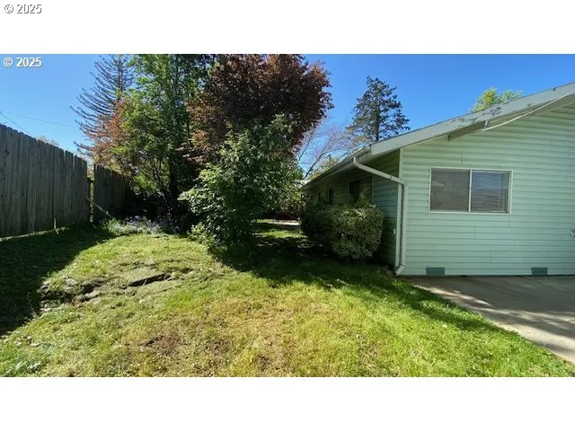 a black and white photo of a house