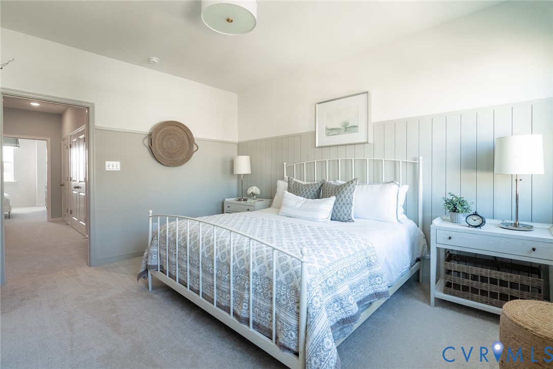 231 Golden Haze Alley, Unit 61 Midlothian, VA 23113 - Photo 24 of 31 a bedroom with a bed and a window