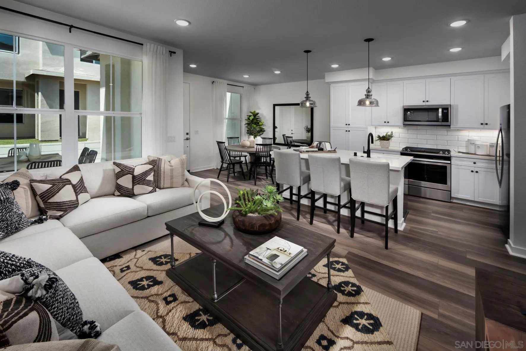 13084 Olympus Circle, Unit 3 Poway, CA 92064 - Photo 1 of 11 a living room with furniture and a large window