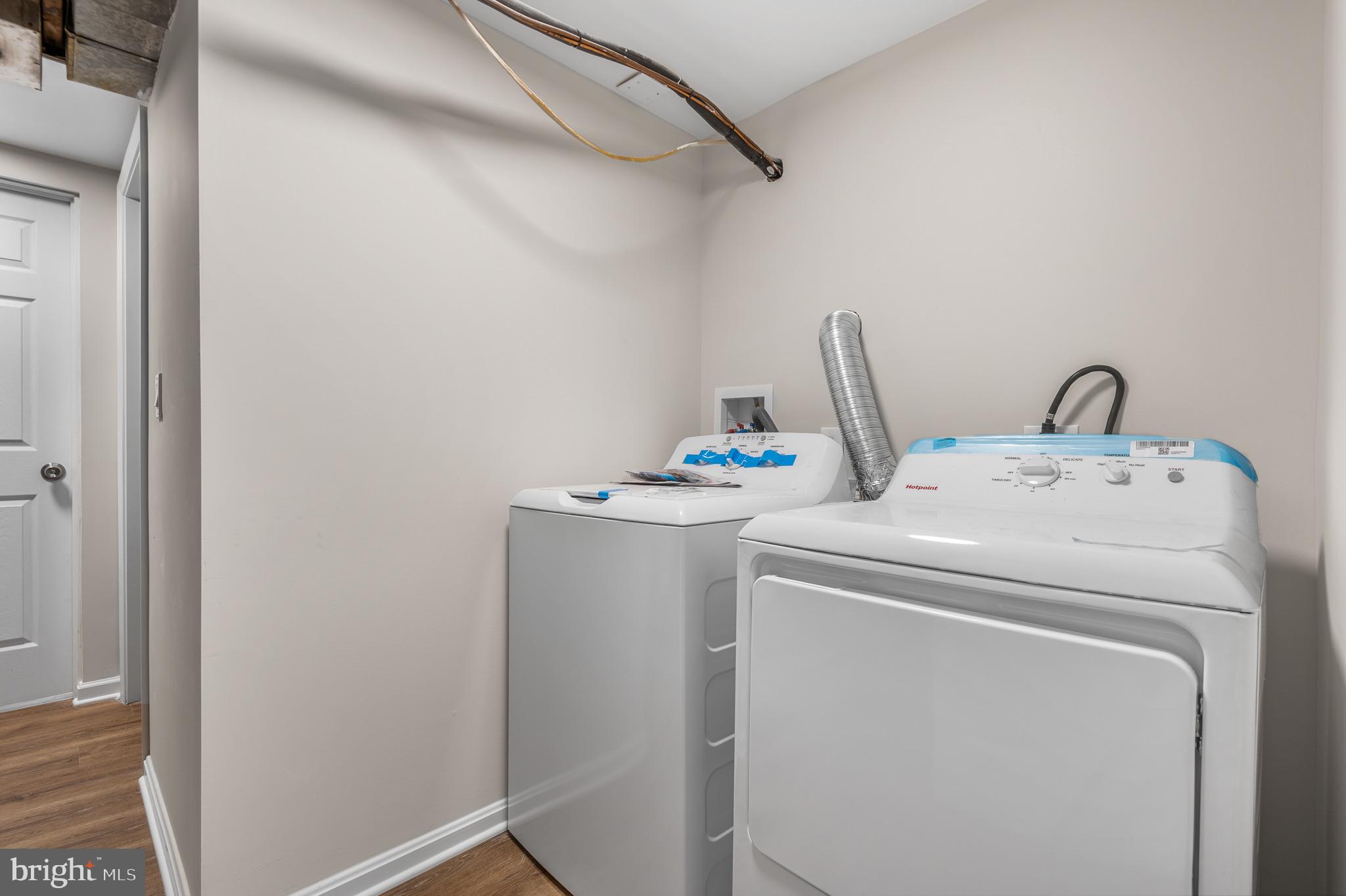 820 Templecliff Road Baltimore, MD 21208 - Photo 32 of 44 a utility room with dryer and washer