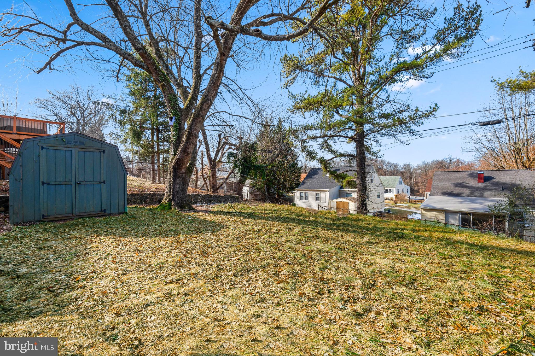 820 Templecliff Road Baltimore, MD 21208 - Photo 39 of 44 a backyard of a house with a trees and a tree
