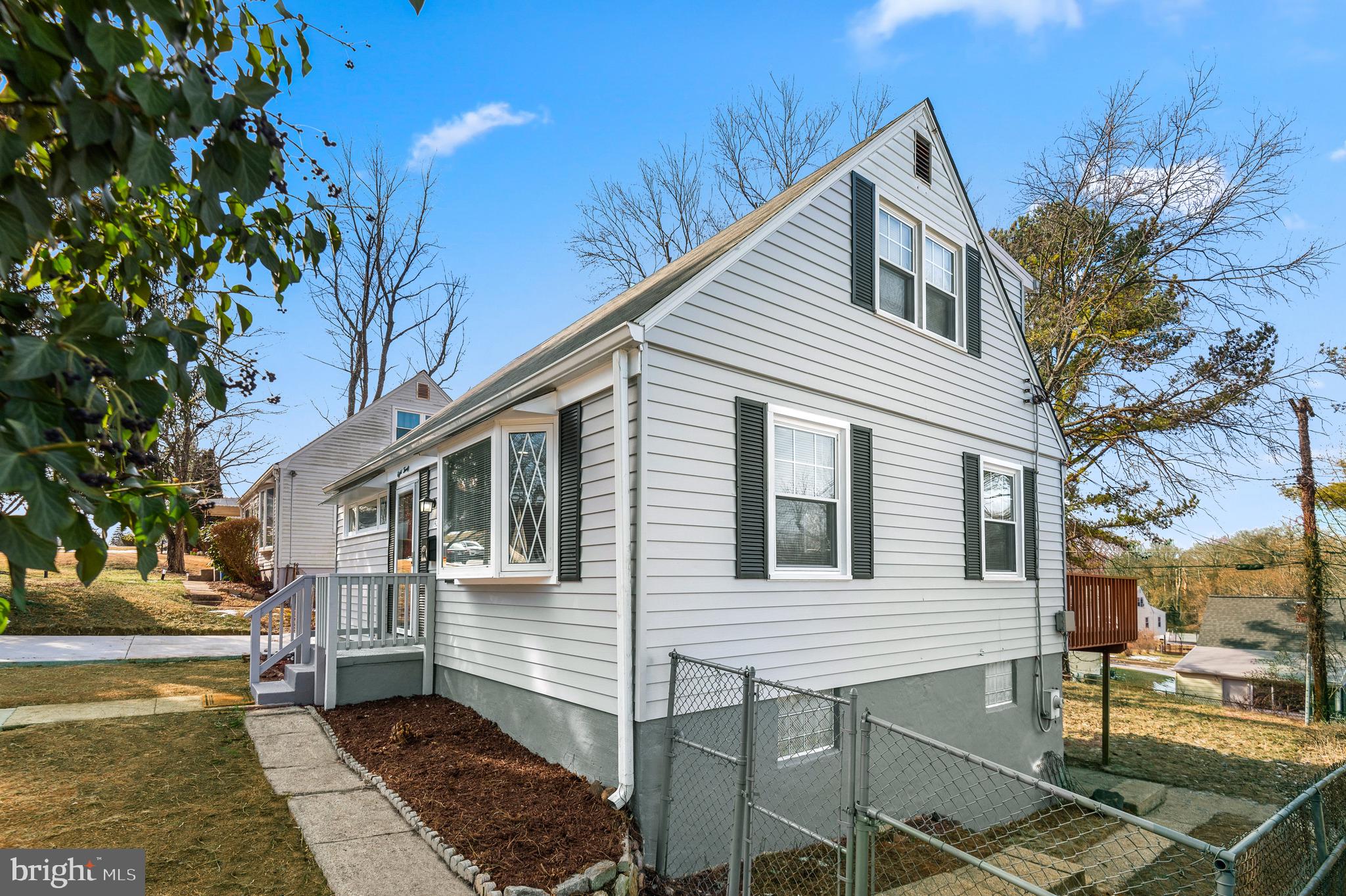 820 Templecliff Road Baltimore, MD 21208 - Photo 4 of 44 a view of a house with a yard