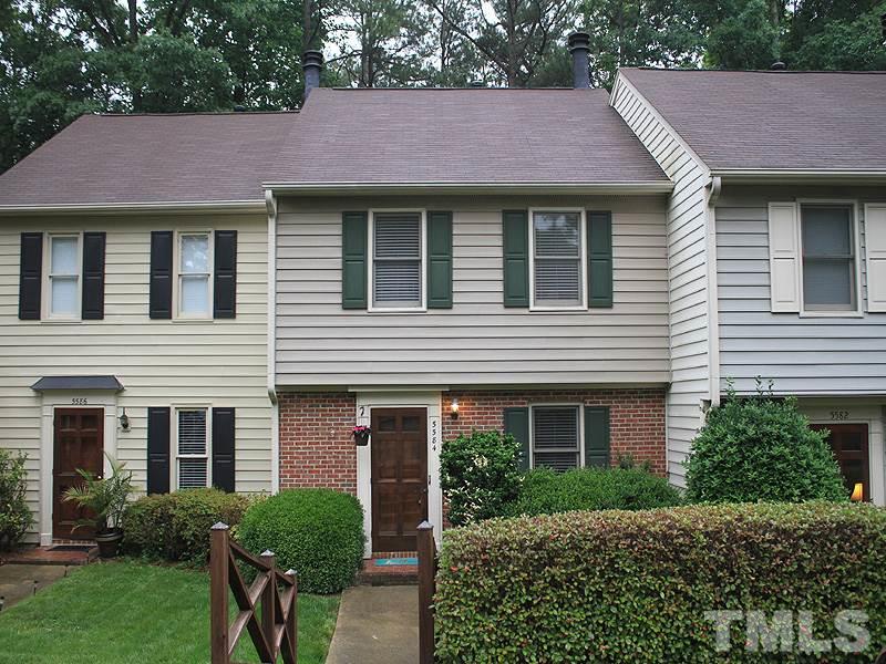 5584 Hamstead Crossing Raleigh, NC 27612 - Photo 1 of 17 a front view of a house with yard and green space