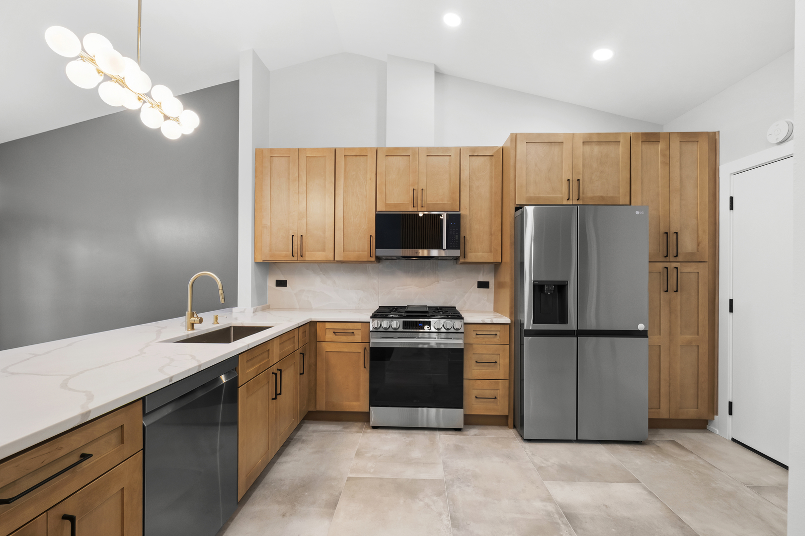 531 Lasalle Lane Buffalo Grove, IL 60089 - Photo 5 of 15 a kitchen with a sink a refrigerator and a stove