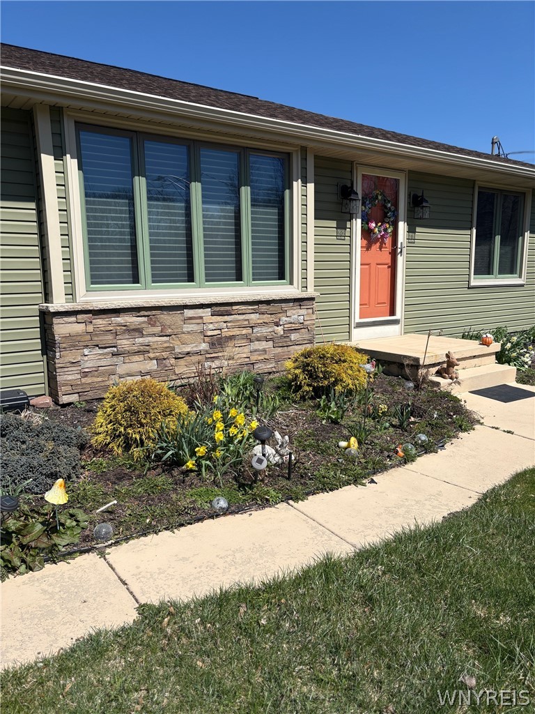 8421 Forest Road Royalton, NY 14067 - Photo 2 of 35 Silewalk Lined With Perennial Flowers