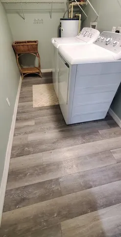 a view of livingroom with furniture and window