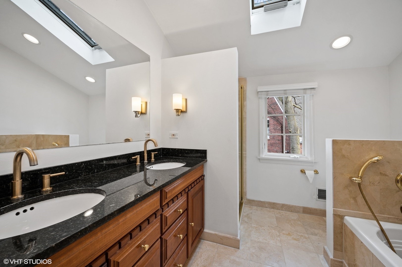 402 Willow Road Winnetka, IL 60093 - Photo 16 of 31 a bathroom with a granite countertop double vanity sink and mirror