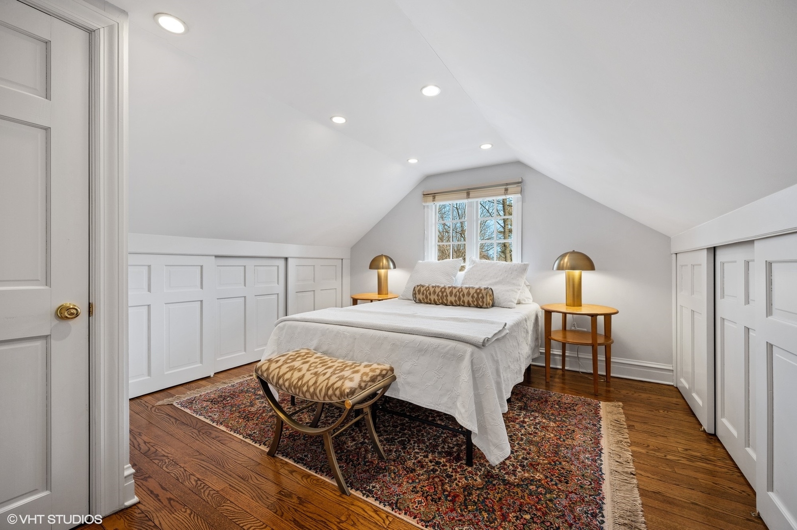 402 Willow Road Winnetka, IL 60093 - Photo 20 of 31 a bedroom with a bed and chair