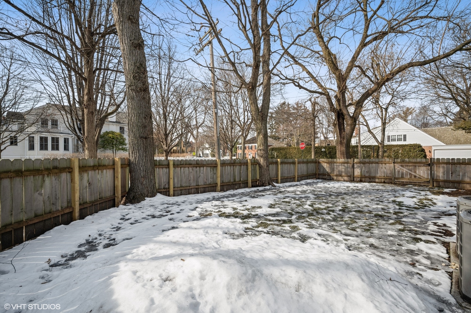 402 Willow Road Winnetka, IL 60093 - Photo 25 of 31 a view of a backyard of snow
