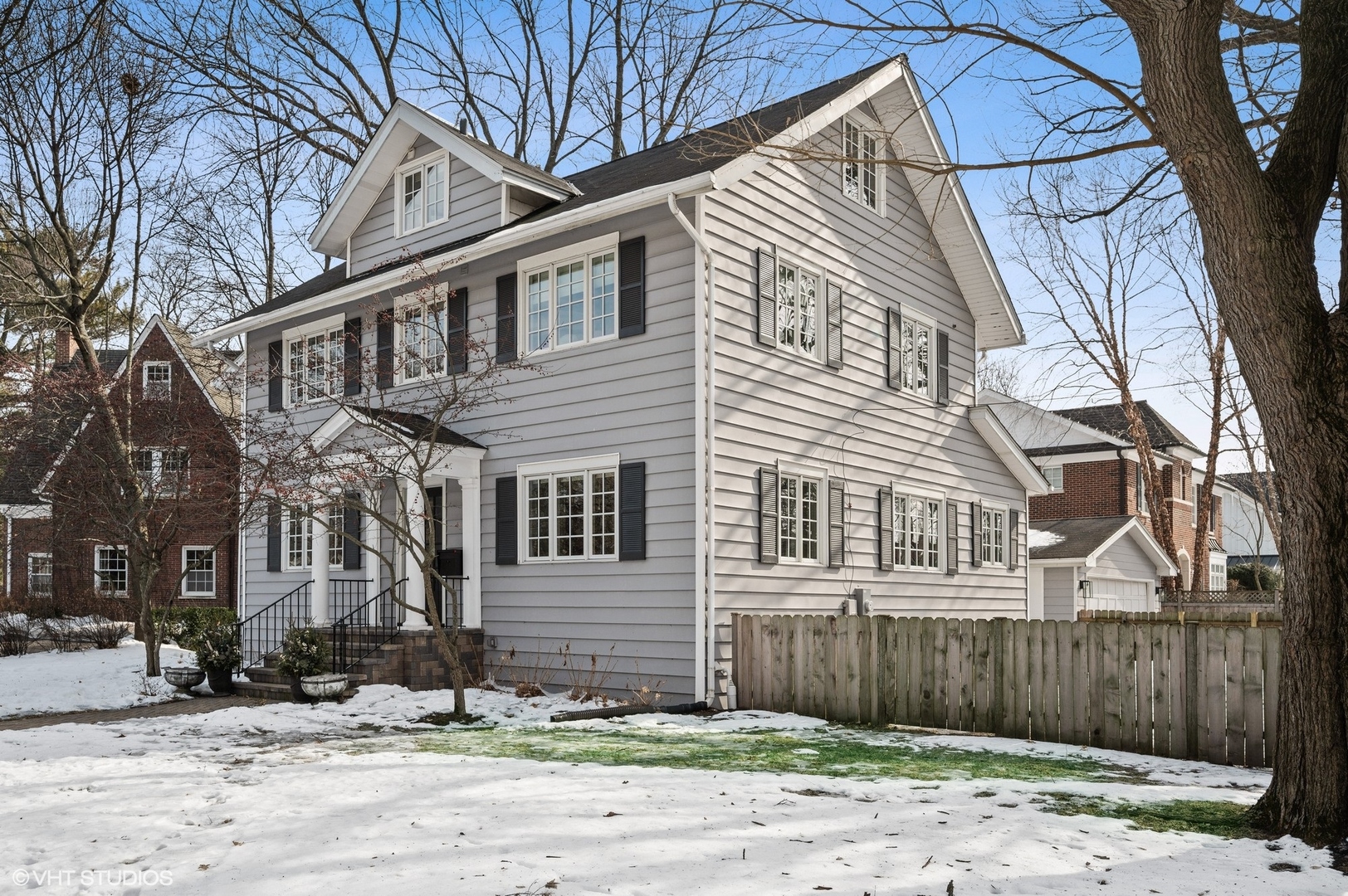 402 Willow Road Winnetka, IL 60093 - Photo 27 of 31 a front view of a house with a yard