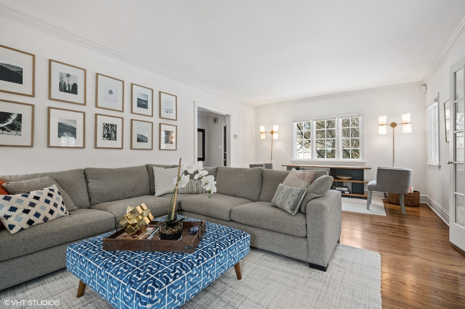 402 Willow Road Winnetka, IL 60093 - Photo 3 of 31 a living room with furniture a rug and a window