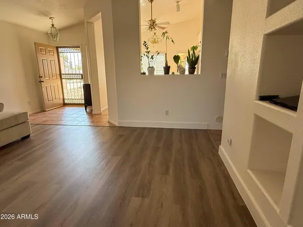 a view of a hardwood floor in a room