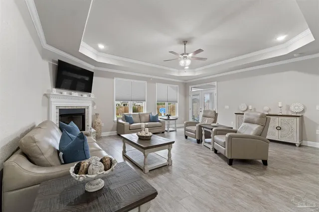 a living room with furniture and a fireplace