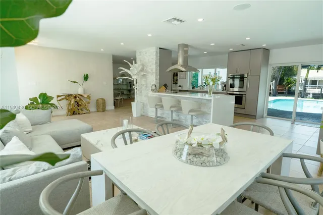 a living room with furniture and window