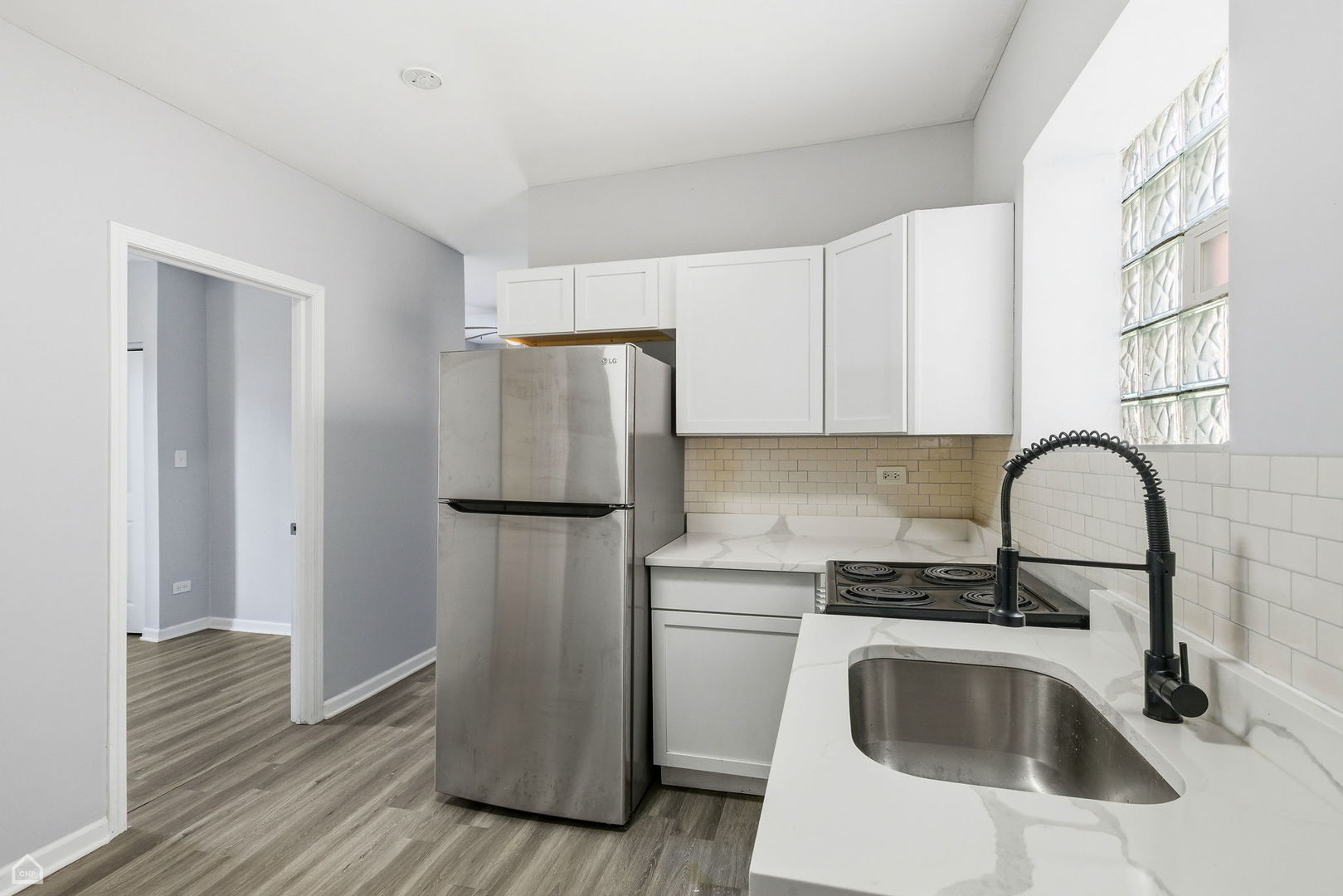 16 East 118th Place, Unit 1F Chicago, IL 60628 - Photo 4 of 14