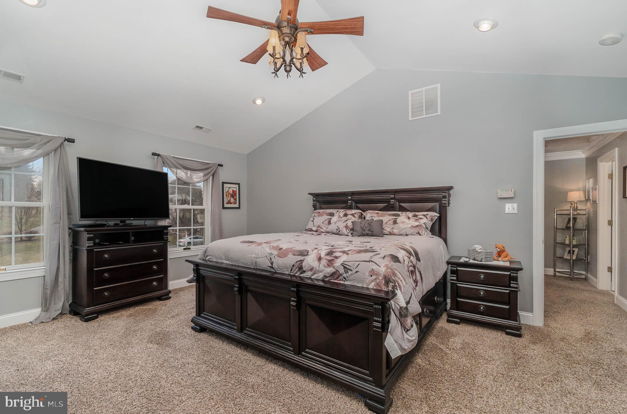 2375 Carrollton Road Westminster, MD 21157 - Photo 16 of 37 a bedroom with a bed and a flat screen tv