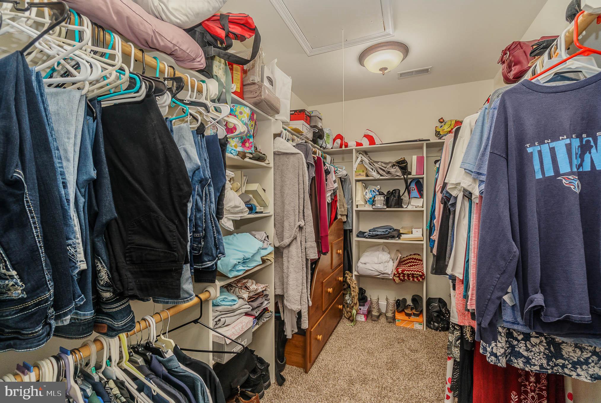 2375 Carrollton Road Westminster, MD 21157 - Photo 18 of 37 a view of walk in closet with clothes