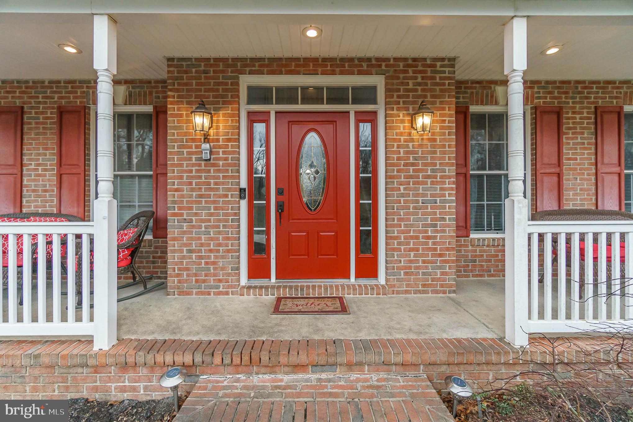 2375 Carrollton Road Westminster, MD 21157 - Photo 3 of 37 a front view of a house with a large window