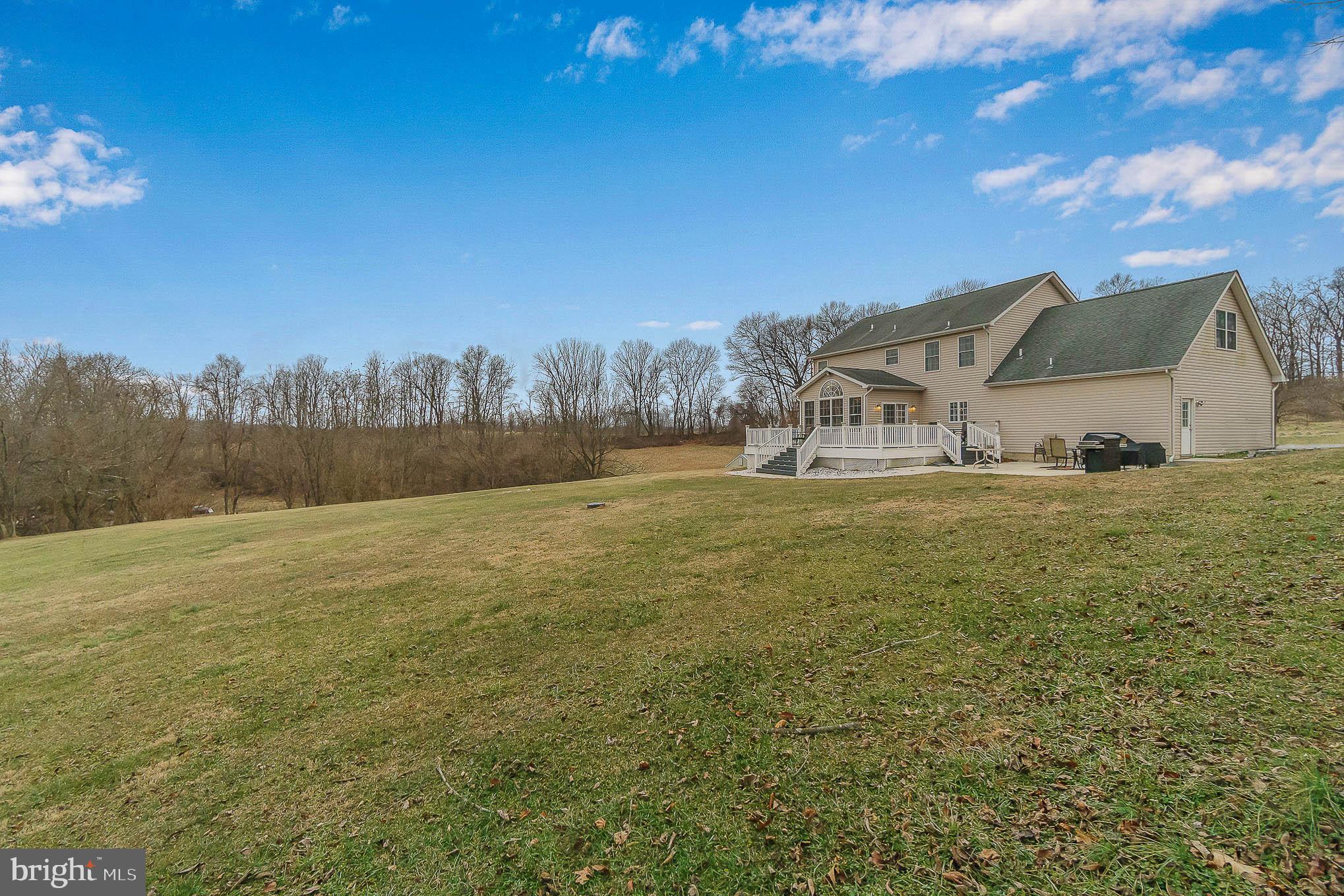 2375 Carrollton Road Westminster, MD 21157 - Photo 32 of 37 a big yard with lots of tress in it