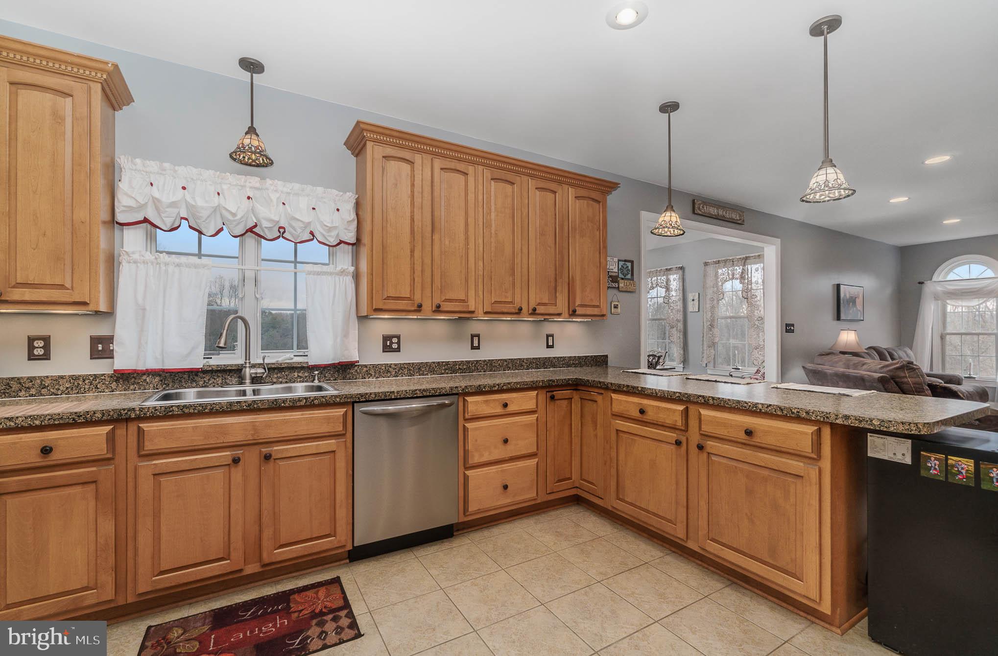 2375 Carrollton Road Westminster, MD 21157 - Photo 10 of 37 a kitchen with a sink and cabinets