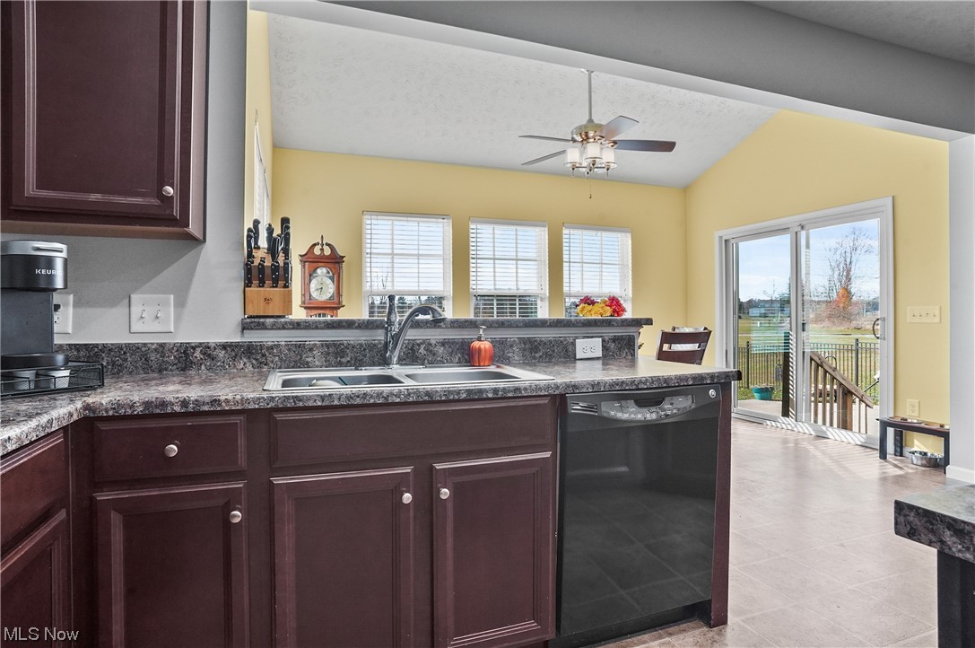 4169 Whitestone Road Kent, OH 44240 - Photo 14 of 33 Kitchen with ceiling fan, a wealth of natural light, black dishwasher, and sink