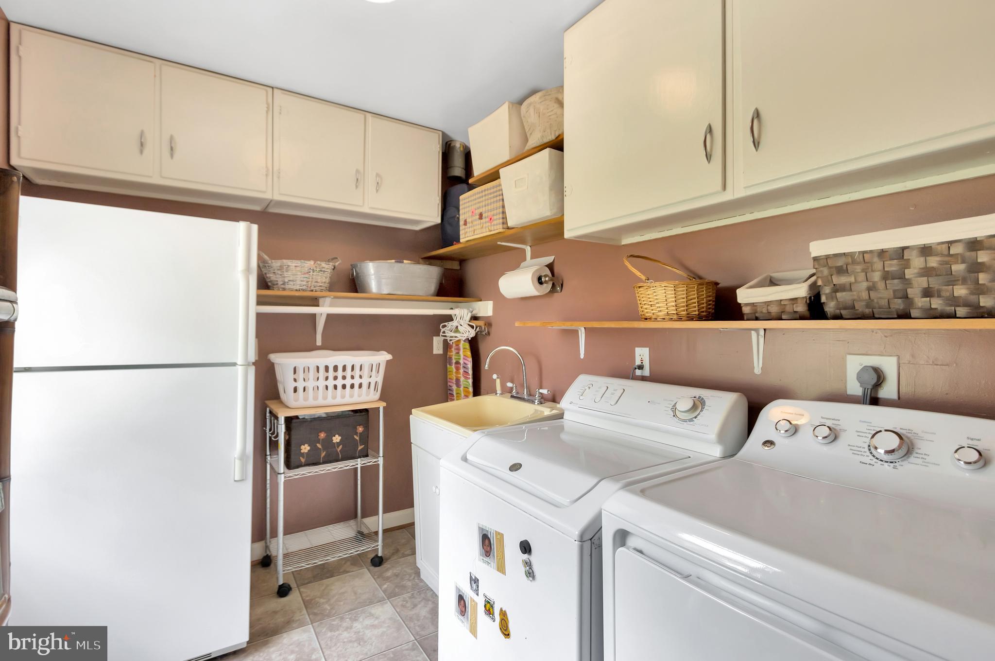 3131 Cofer Road Falls Church, VA 22042 - Photo 21 of 40 Laundry room first level and extra refrigerator
