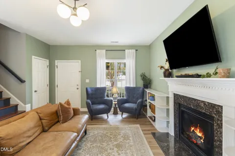 a kitchen with a sink appliances and cabinets