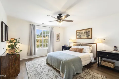 a house view with swimming pool in front of it