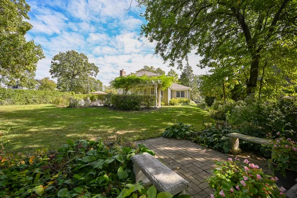 a view of backyard with green space