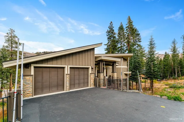 a room with lots of wooden furniture and a table