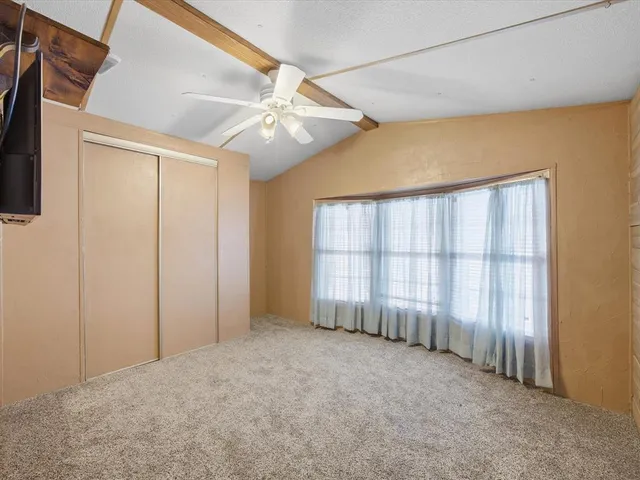 a view of a livingroom with wooden floor