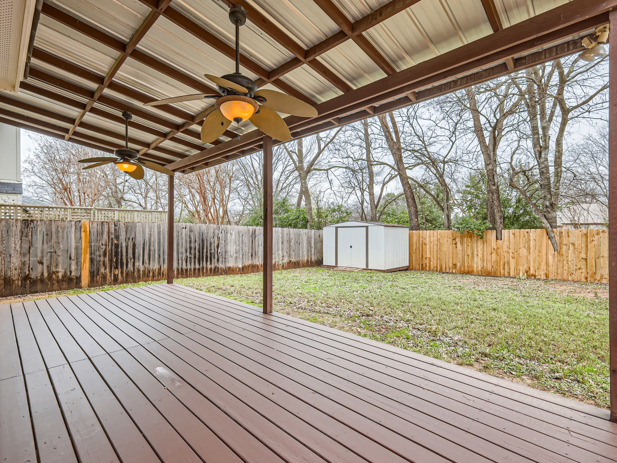 5814 Steven Creek Way Austin, TX 78721 - Photo 13 of 15 a view of backyard with wooden fence