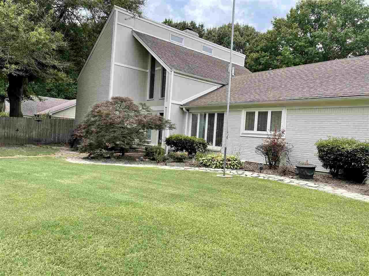 Large corner lot with iron gate