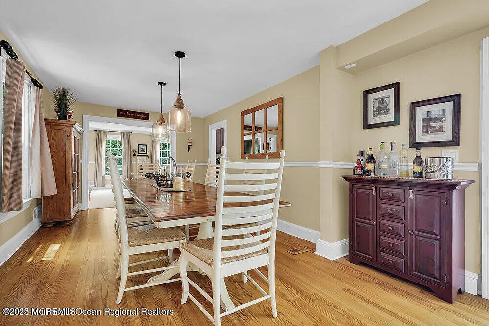 1722 Burrsville Road Brick, NJ 08724 - Photo 12 of 27 a view of a dining room with furniture window and wooden floor