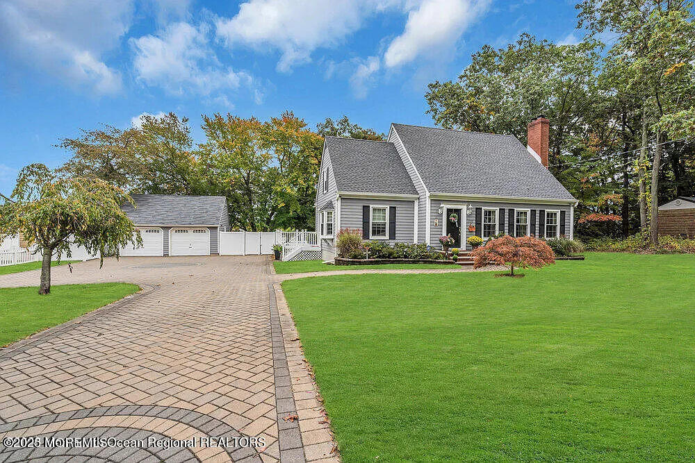 1722 Burrsville Road Brick, NJ 08724 - Photo 5 of 27 a front view of a house with a yard