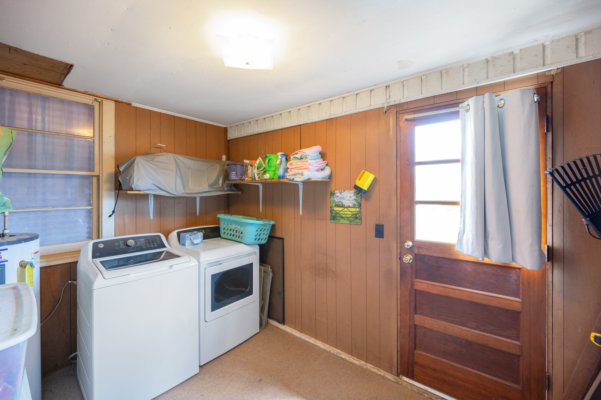 252 Luna Street Decaturville, TN 38329 - Photo 13 of 21 a utility room with dryer and washer