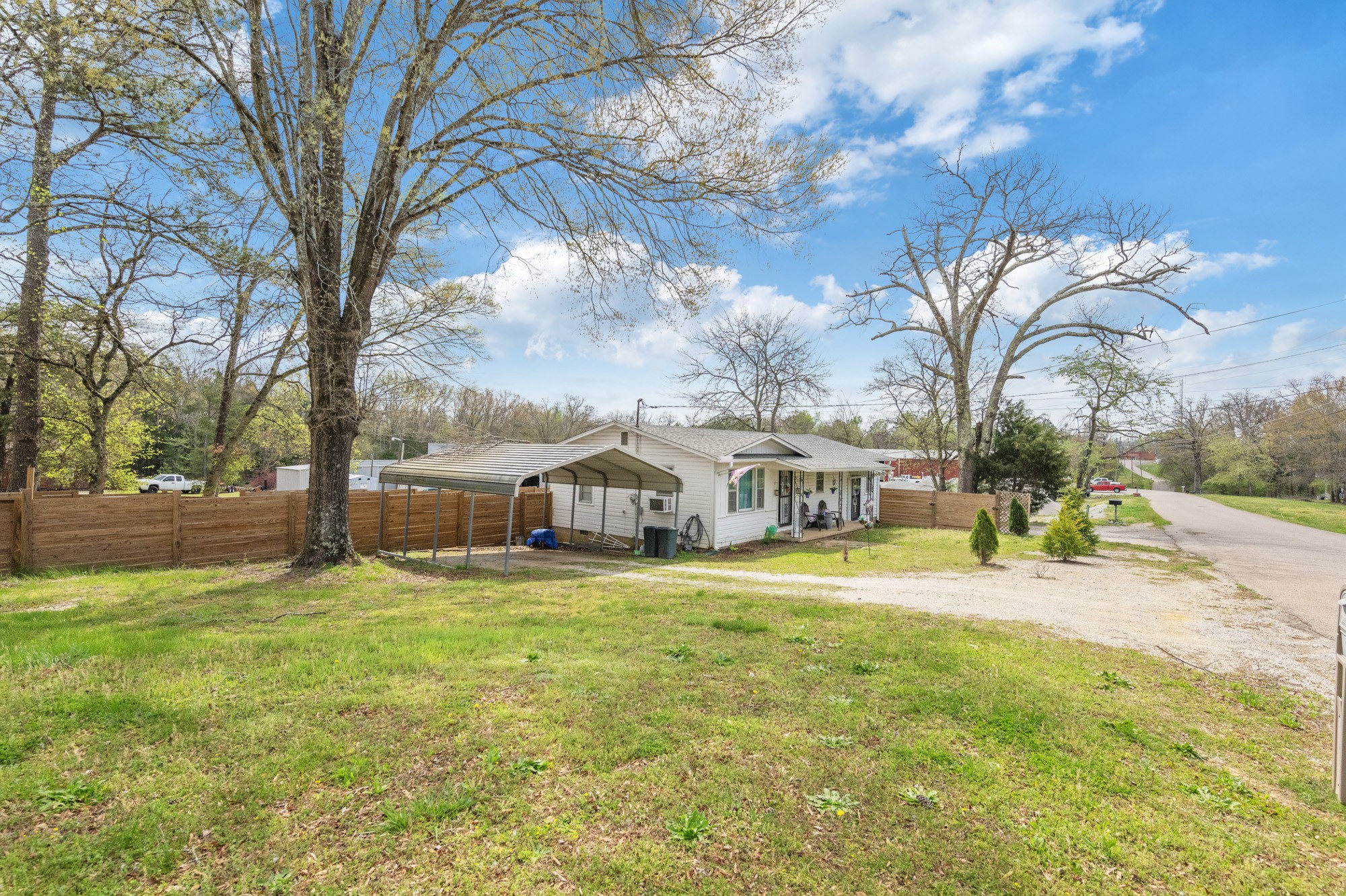 252 Luna Street Decaturville, TN 38329 - Photo 14 of 21 a view of a house with a big yard