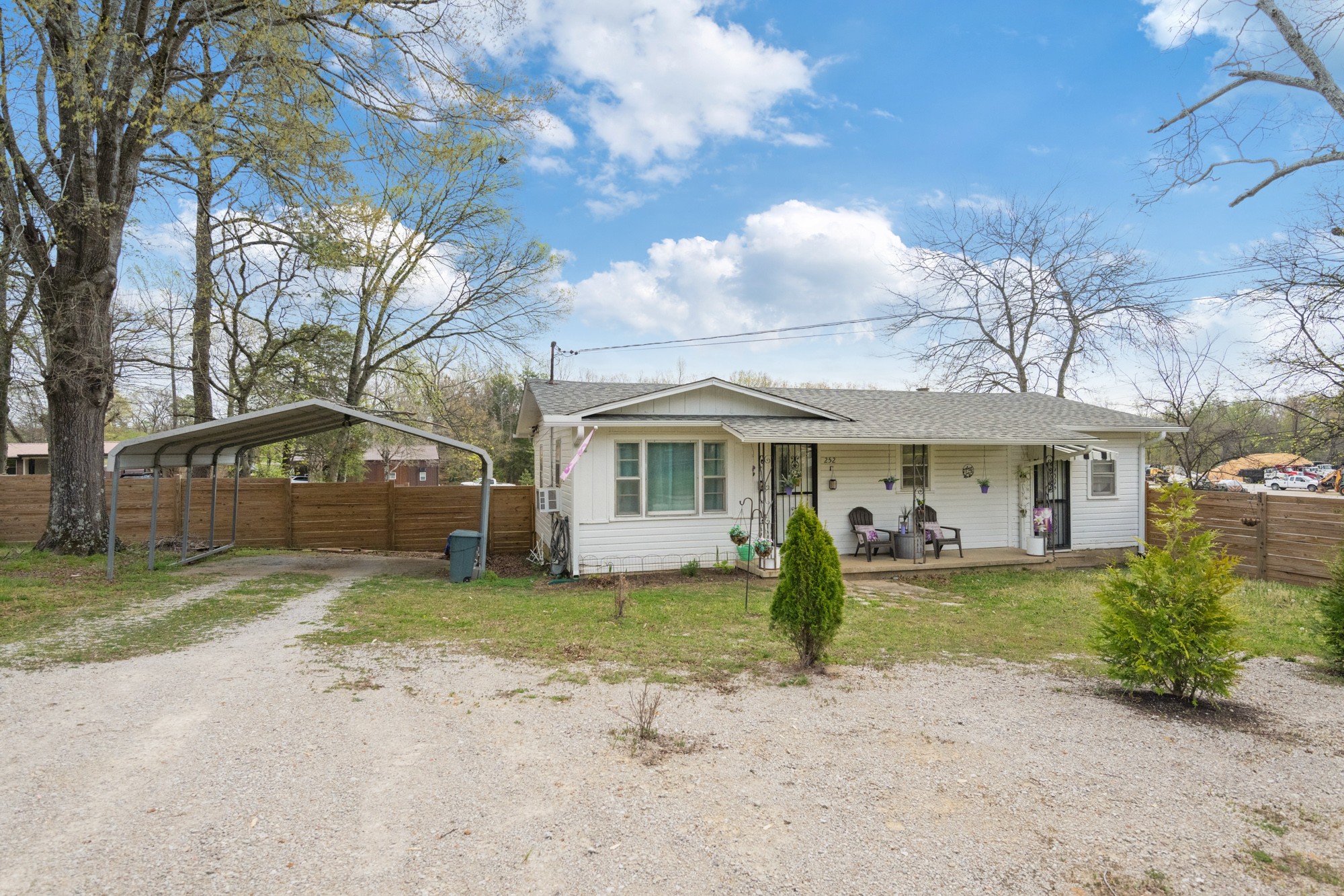 252 Luna Street Decaturville, TN 38329 - Photo 21 of 21 a view of a house with a big yard and large trees