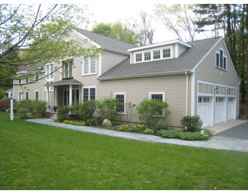 54 Suffolk Road Wellesley, MA 02481 - Photo 1 of 1 a front view of a house with a yard