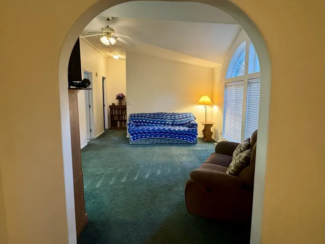 a bathroom with a toilet a sink and a mirror