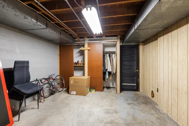 a view of workspace with furniture and a window