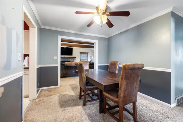 a view of a dining room with furniture