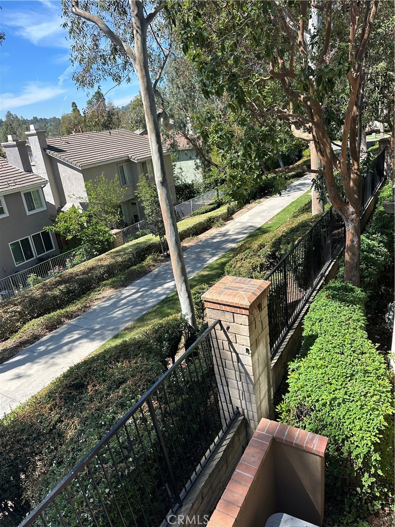 8514 East Baker Hill Road, Unit B Orange, CA 92869 - Photo 11 of 19 a view of a yard with pathway