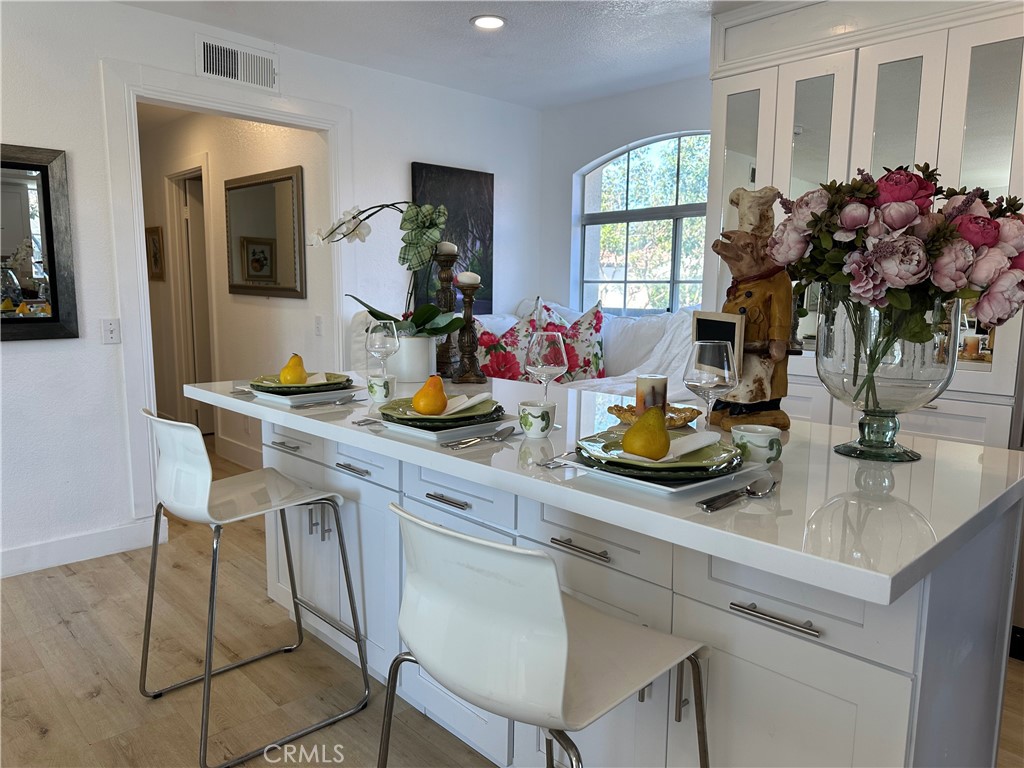 8514 East Baker Hill Road, Unit B Orange, CA 92869 - Photo 15 of 19 a kitchen with a sink cabinets and window