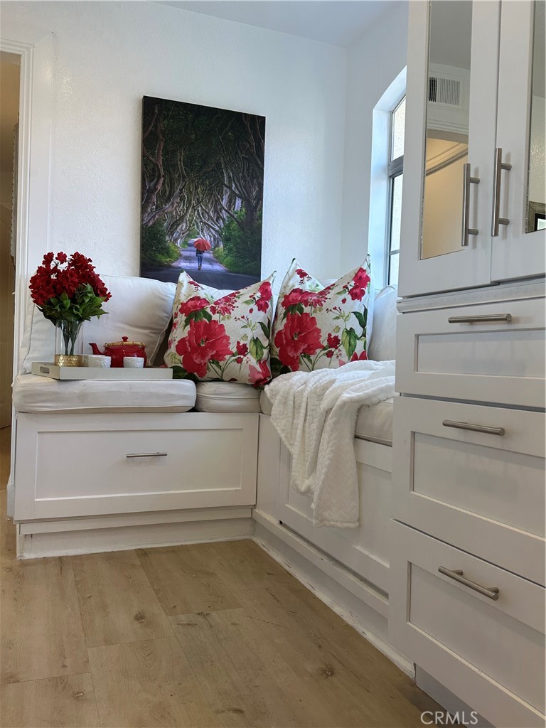 8514 East Baker Hill Road, Unit B Orange, CA 92869 - Photo 8 of 19 a bedroom with a bed and a dresser