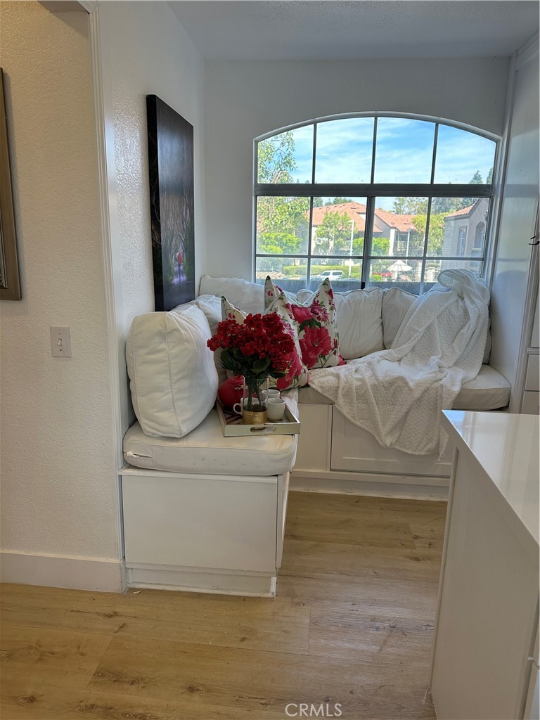 8514 East Baker Hill Road, Unit B Orange, CA 92869 - Photo 9 of 19 a living room with furniture and a large window