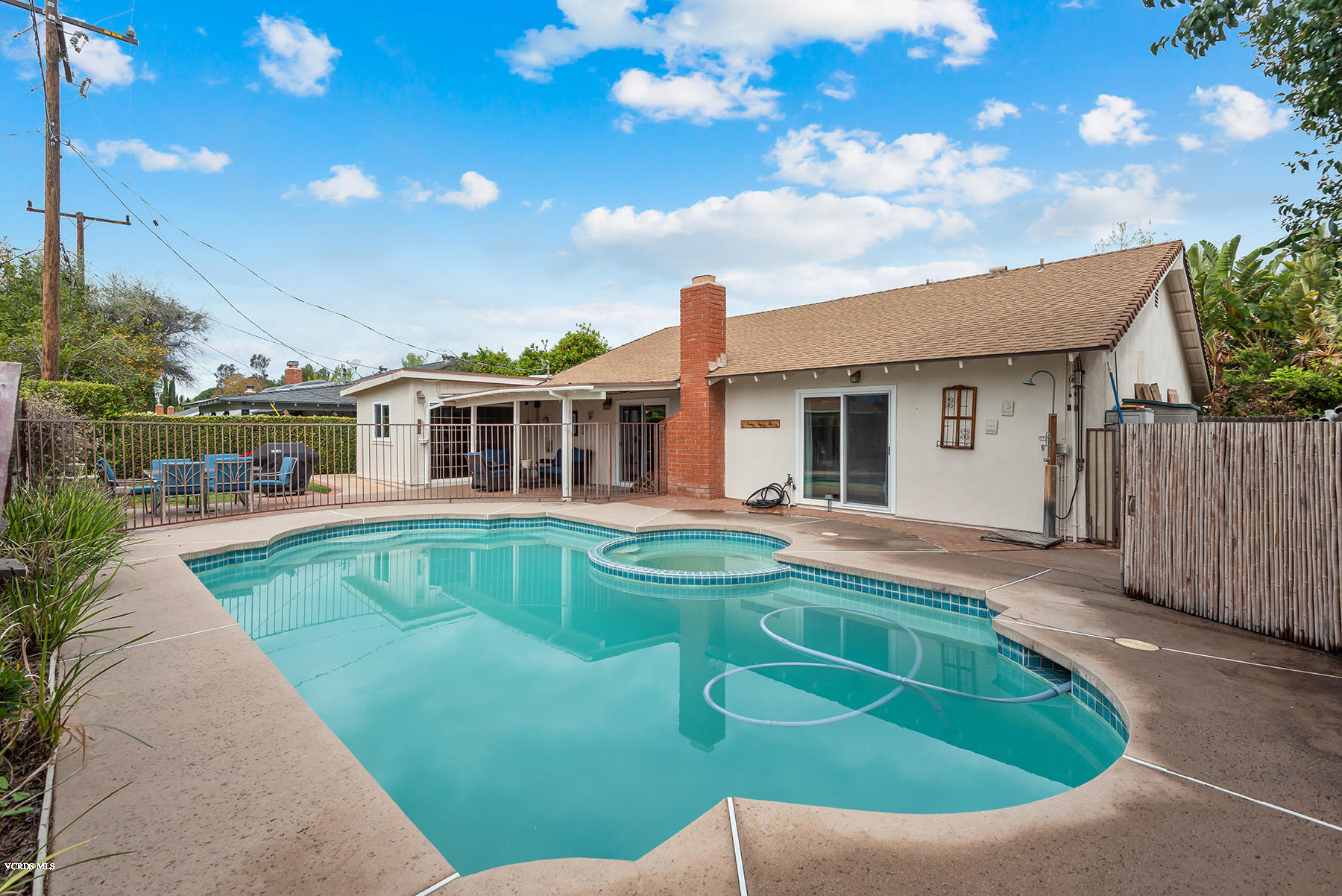 2974 Racine Street Simi Valley, CA 93065 - Photo 8 of 30 a view of a house with a swimming pool